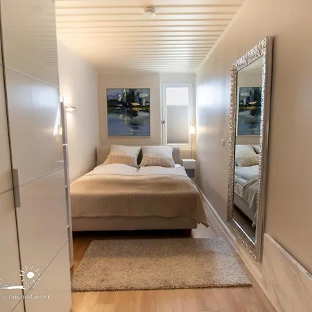 Holiday home 59 Suedstrandglueck App.68-004